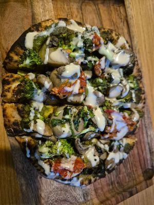 Vegan mushroom pesto pizza at Metta Cafe in Leh