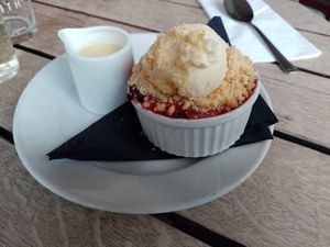Vegan fruit crumble with ice cream and custard 😋 at Makars Mash Bar - Edinburgh in Edinburgh