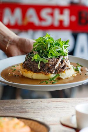 Mixed Mushrooms with Rocket Crown and Tarragon creamy sauce at Makars Mash Bar - Edinburgh in Edinburgh