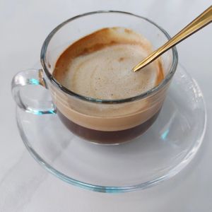 Macchiato with oat milk at Les Cappuchinas in Oranjestad