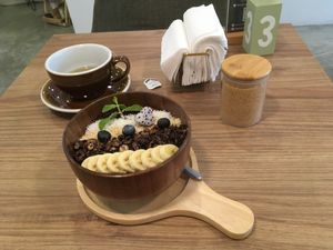 Coconut-milk-based chocolate porridge with fruits at Kia Ora Café in Koh Phangan