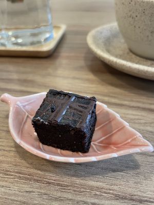 Complimentary brownie bite with coffee  at Kia Ora Café in Koh Phangan