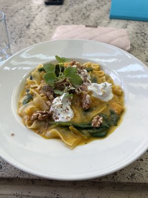 Vegan zucca pasta (with pumpkin, walnuts, coconut, spinach)  at Olive & Angelo in Brisbane