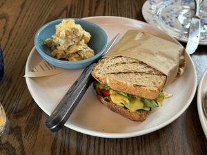 Pesto sandwich with potato salad. Yummy   at Blossom & Root Kitchen in Danville