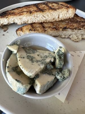 Sourdough with blue cheese and vegan honeyy  at Blossom & Root Kitchen in Danville