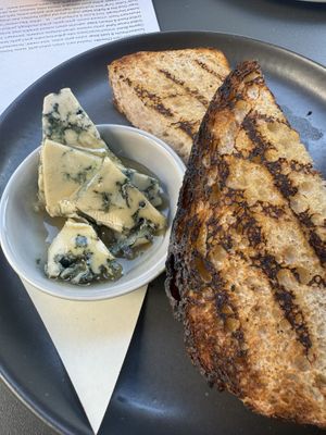 Delicious Climax Blue Cheese with Honey and crusty sourdough.   Sooo good! All vegan!   at Blossom & Root Kitchen in Danville