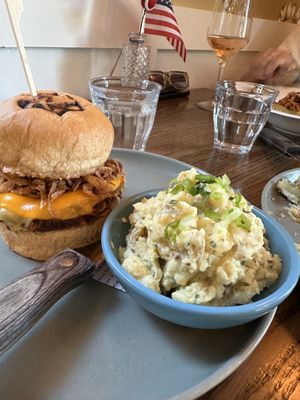 Burger and potato salad   at Blossom & Root Kitchen in Danville