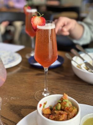 Champagne cocktail with strawberry syrupp  at Blossom & Root Kitchen in Danville