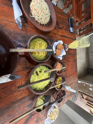Noodles on left (served with lentil dhal) and curry dishes on the rightt  at Coconut Shades  in Sigiriya