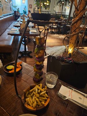 Vegan Turmeric spiced tofu with seasoned Fries. at The Botanist  in Ipswich