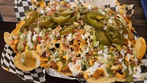 Loaded nachos with vegan chicken!!! at El Compa Vegano in San Fernando