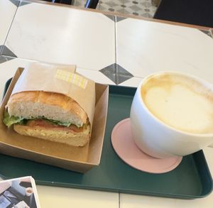 Oat milk latte and eggless sandwich   at Salon de Vegan in Seoul