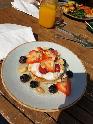 Pancakes with fresh fruits and coconut yoghurt at The Gallery Cafe in East London