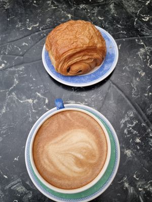 Latte and pain au chocolate at The Gallery Cafe in East London