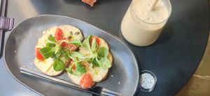 Hummus toast and vegan milkshake at Oteiza Coffee in Granada