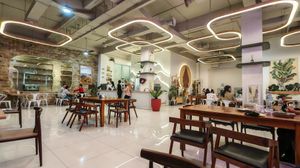 Inside embient is very cozy and wide space for gathering. at Botanic Coffee in Batam