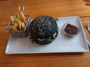 A different choice with a vegan burger but in a black bum that may be not even vegan. at Zombie Bar in Madrid