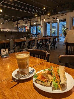 Large cappuccino and a hummus baguette at August in The Hague