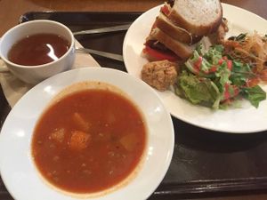 The lunch set with tempeh sandwhich, salad, two tiny pieces of the muffin of the day and some hot tea and soup!  at Pure Cafe in Tokyo