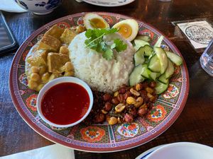 Nasi Lemak (egg on side given to partner) at Kedai Makan in Seattle