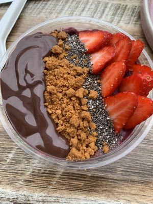 Açai bowl with vegan Nutella, biscoff crumbs, chia seeds and strawberriess  at SMOOCH in Dublin