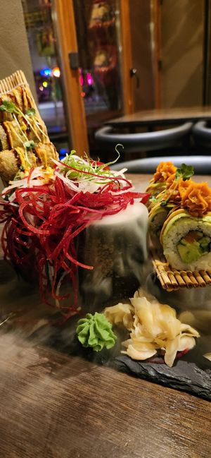 I can't recall the names of these menu items, but I got a 4pc and 6pc roll... presentation is everything! at Golden Ginkgo  in Berlin