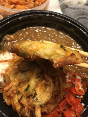 Vegetable kakiage curry donburi  at Ikedo Ramen in Port Washington