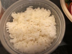 Steamed white rice   at Ikedo Ramen in Port Washington