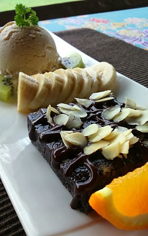 The amazing pecan brownie with vanilla cashew ice cream at Atsumi Raw Cafe in Phuket