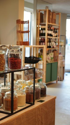 Several types of sugar, breakfast items, and, in the background, wine and sodas. at Kolibri in Soenderborg