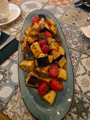 Aubergine, tomate & sweet sour sauce at Navat in Almaty
