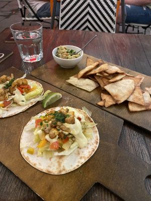 Cauliflower tacos and Tortilla Chips   at Taqueria - Tacos & Drinks in Tallinn