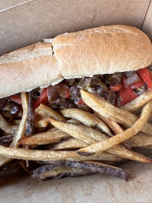 Steak and cheese grinder with friess  at Eat in Springfield