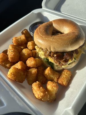 Breakfast sandwich with tots  at Eat in Springfield