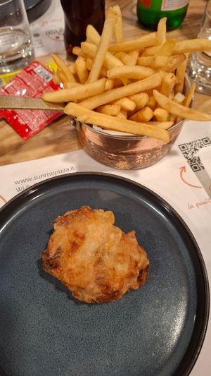 Frittatina vegana e patatine fritte at Sunrise Pizza in Caserta