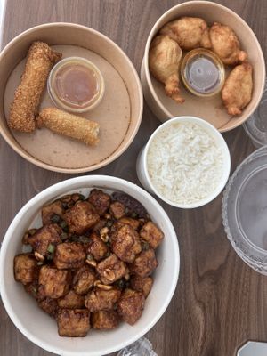 Vegan shrimp, coconut fritters, and kung pao tofu.  at Cisu Vegan House in Hanover