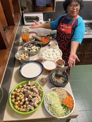 Meal prep and cooking after   at Bu Herni's Cooking Course in Yogyakarta