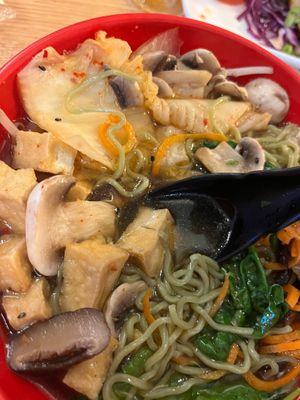 Closer image of kale noodles and tofu from bowl at Soupa Noodle Bar in Jacksonville