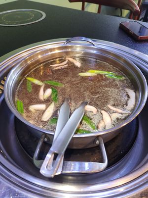 Mushroom broth at Lotus Hot Pot & Grill in Gladstone