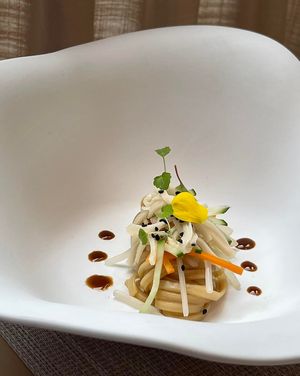 Mock abalone, carrot, cucumber, sprouts, spicy Inaniwa cold noodles 素鮑魚拌辣稻庭冷麵 (Photo by 聞西煮意) at Yuan 圓 in Hong Kong Island