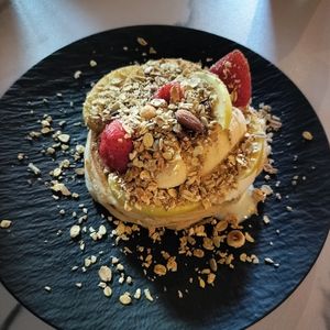 Breakfast pancakes: strawberry, banana, apple, yoghurt and granola at Mr NonNo - The Hague in The Hague