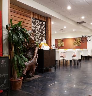 This does not depict the full restaurant. There is also a large dining spaces behind the photographer. at Bodhi Veggie Cuisine in Rosemead