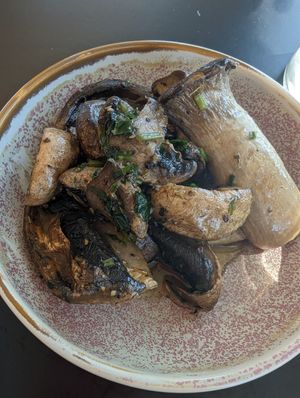 side of garlic mushies at For Change Cafe in Bellfield