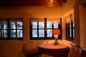 Quiet table in the Beige Boutique Apartment. at Vila Castelul Maria in Banpotoc