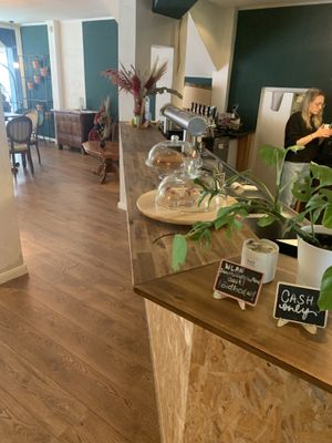 The bar (with cakes and coffee)  at Damals Hinterm Mond in Marburg