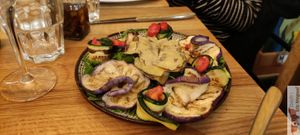 Grilled zucchini and eggplant, cherry tomatoes, Contadina artichokes at Martha Pizze Amore in Paris