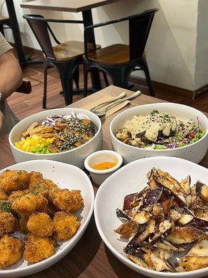 Signature caulibites , Buddha bowl ( LOVE the falafels) eggplant crunchies again , and the tofu bowl  at Tiny Food Cafe in Kuala Lumpur