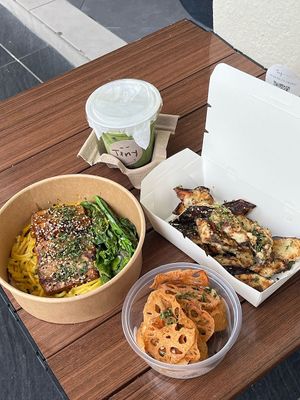 Tofu charsiu curry pasta , very interesting and flavorful , inari bag and eggplants crunchies with green juice.  at Tiny Food Cafe in Kuala Lumpur