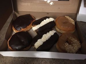 Donuts: Boston cream, eclairs, maple glazed at Bliss Baked Goods in Edmonton