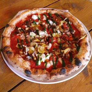 Vegan pizza with fried artichokes (a must try!) 😋 at Paneria in North London